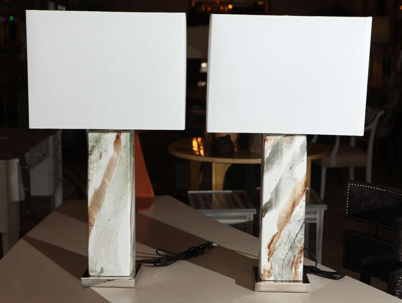 Pair of Italian porcelain mid-century table lamps with marble pattern. 
Visit the Paul Marra storefront to see more lighting including 21st Century.