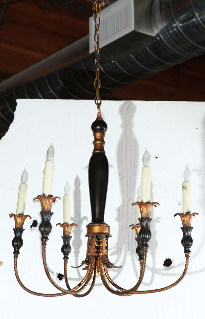 Mid-20th Century Italian wood and gilt metal six arm chandelier.