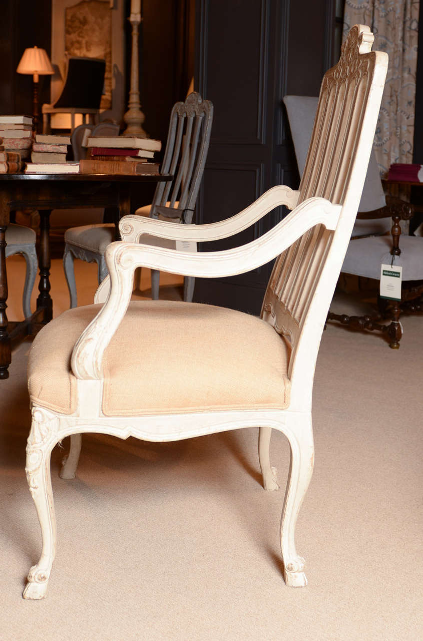 French Fire Side Louis XVI ArmChair, Carved, Curved Legs and Cream Finish In Excellent Condition For Sale In Atlanta, GA