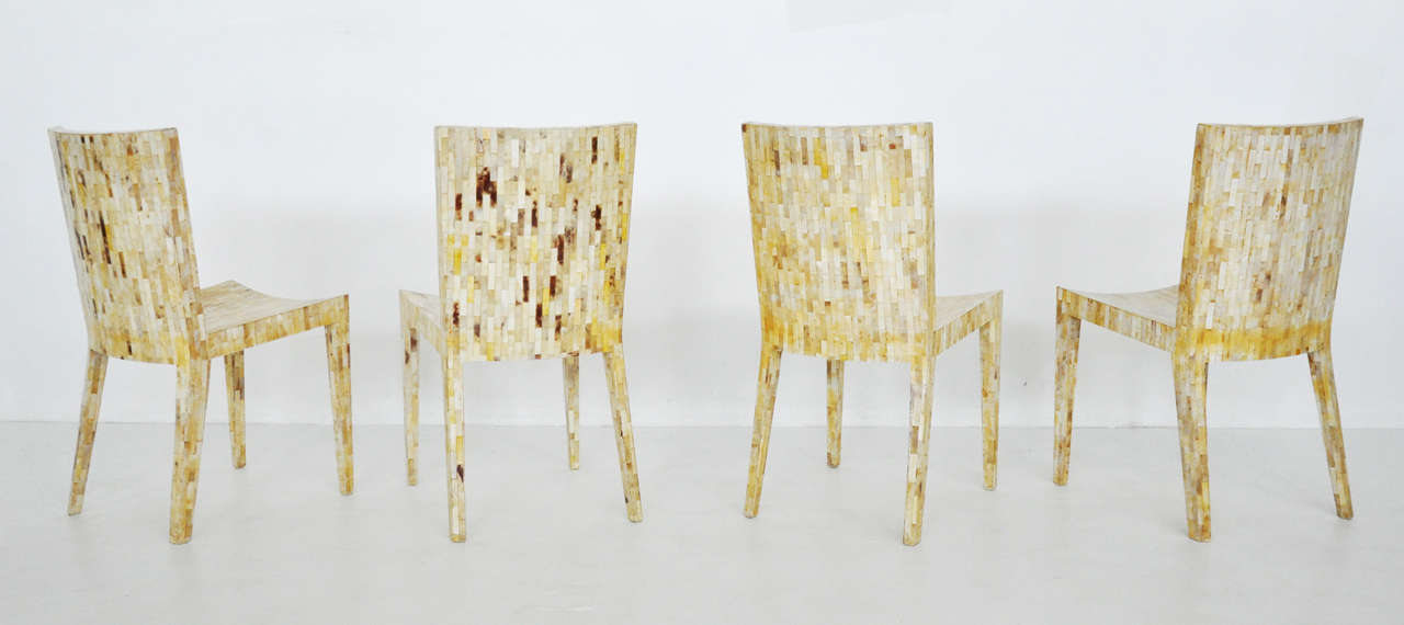 Set of 4 JMF chairs designed by Karl Springer.  Chairs are covered in tessellated  goat skin.