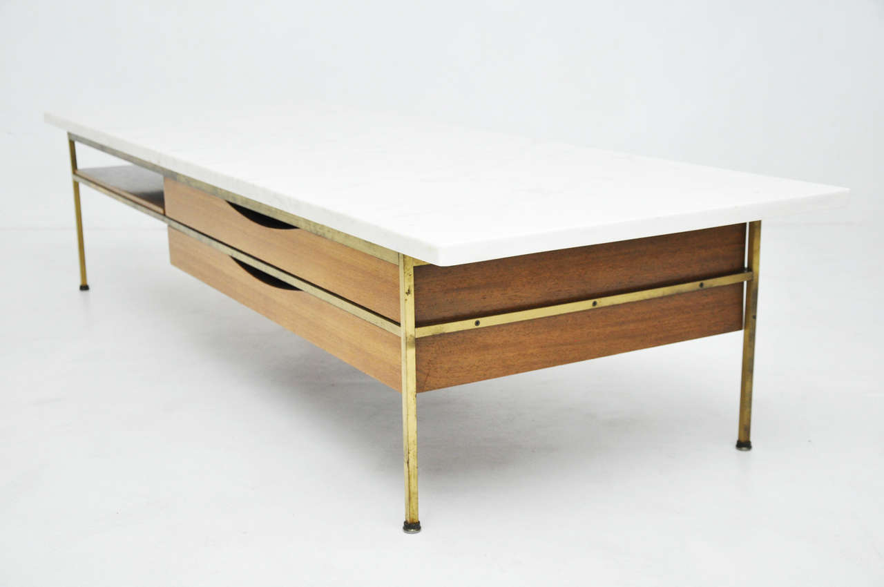 Coffee table designed by Paul McCobb for Calvin Furniture. Brass frame with marble top.