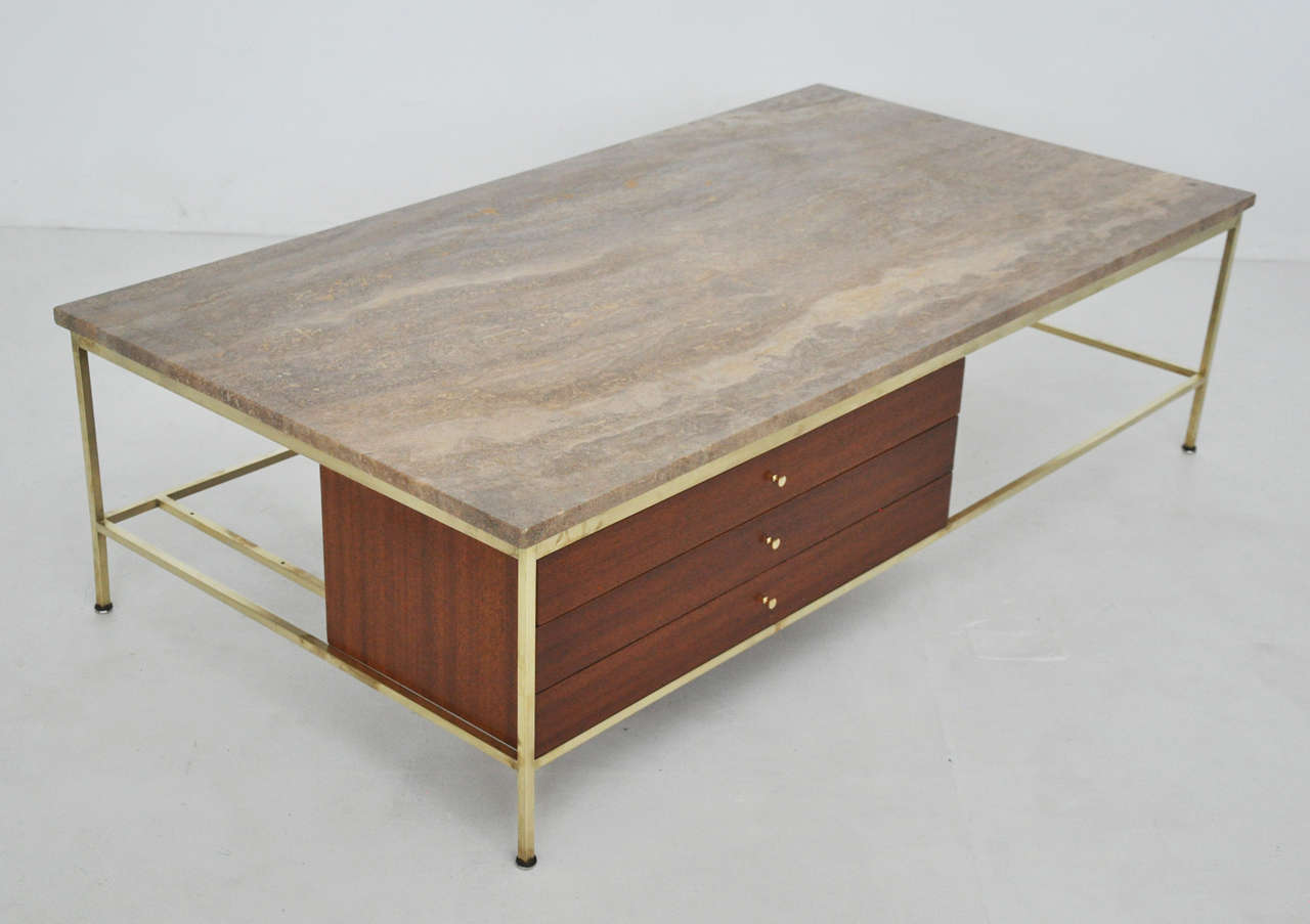 Brass frame coffee table by Paul McCobb for Calvin Furniture.  Fully restored.  Refinished case with travertine top.