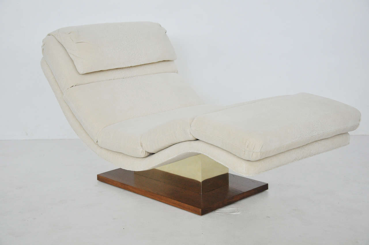Wave chaise on walnut and brass platform.  Newly upholstered in textured velvet.