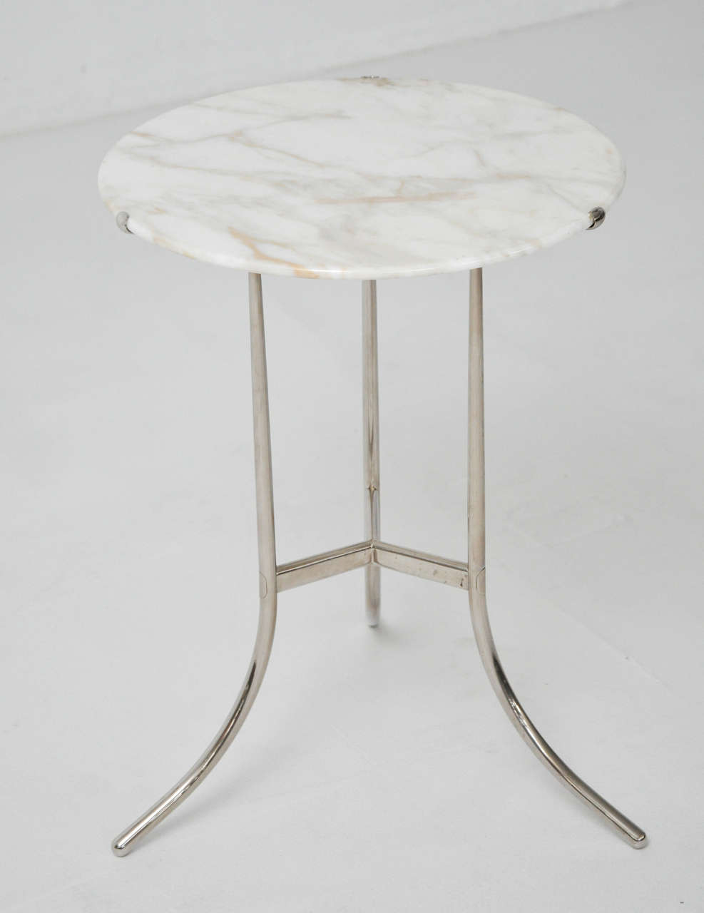 Side table designed by Cedric Hartman, signed and numbered. Polished nickel frame with marble top.