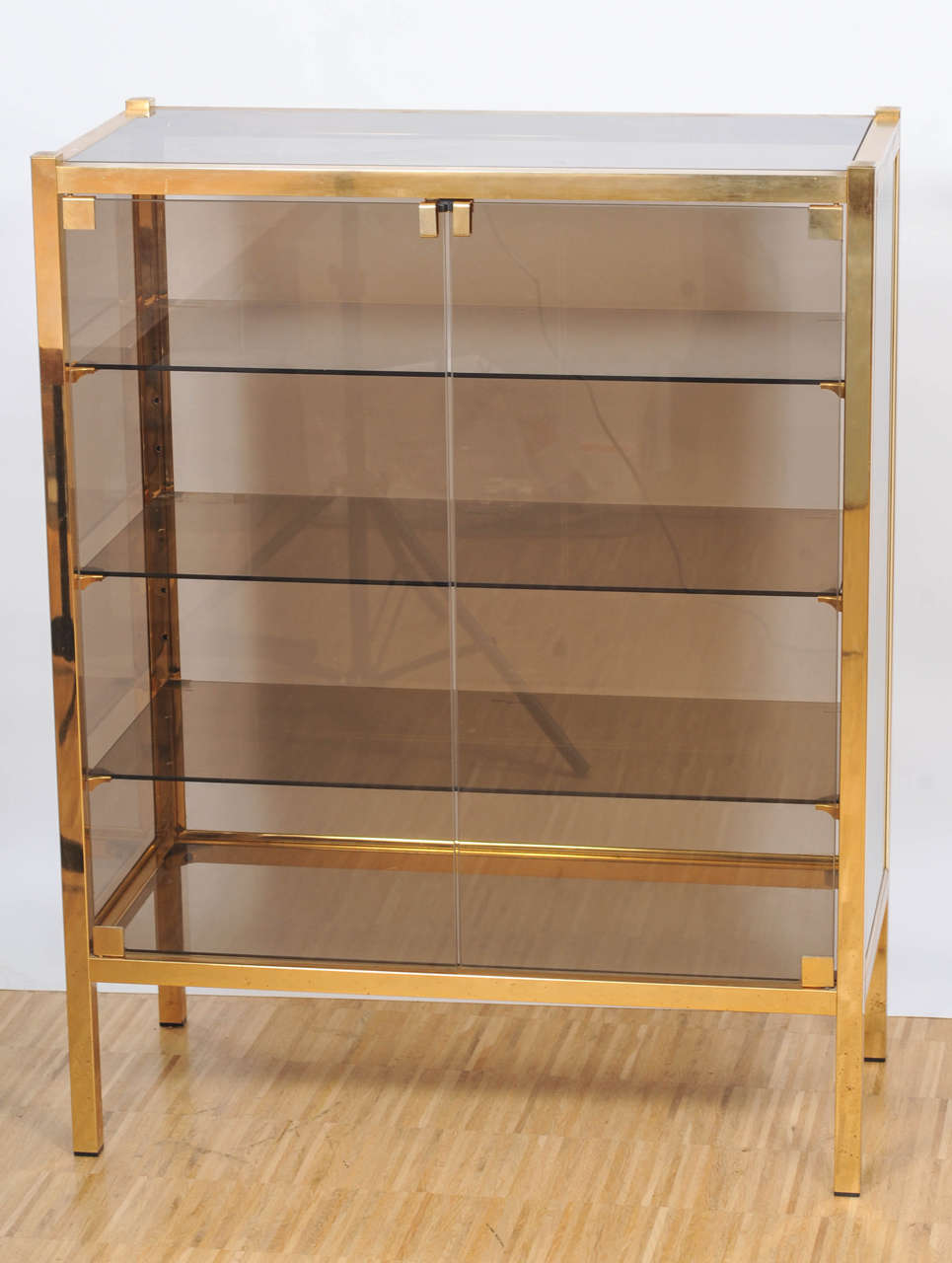 Mid-Century Modern Vitrine of Brass and Smoked Glass in the Style of Maison Jansen