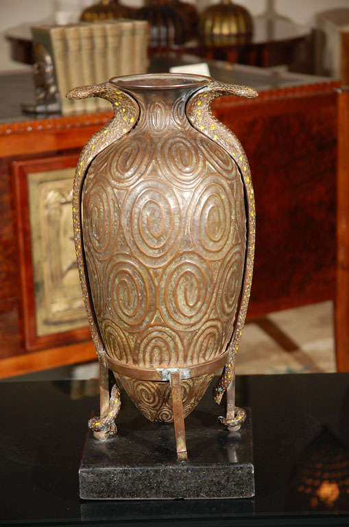 In the style of Jean Dunand 
King cobra motif
Hammered copper on lacquer base
Also available as a pair