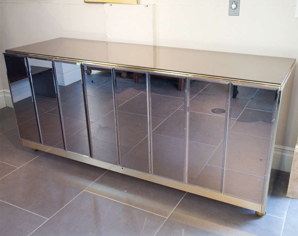 Mirrored console with hidden wine cabinet and bar