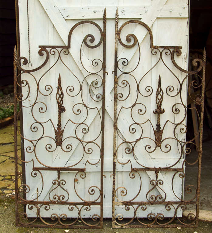 Unique pair of wrought iron garden gates; superb wrought iron craftsmanship