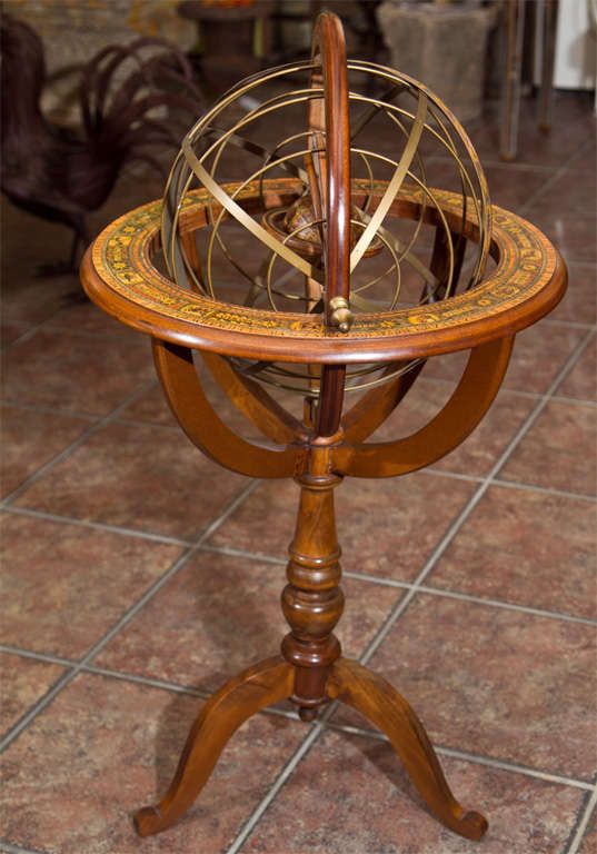 This armillary sphere, with its interlocking rings illustrates the circles of the sun, moon, known planets, and important stars as well as the signs of the zodiac and months of the year.