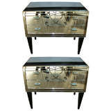 Pair of commodes in mirror.