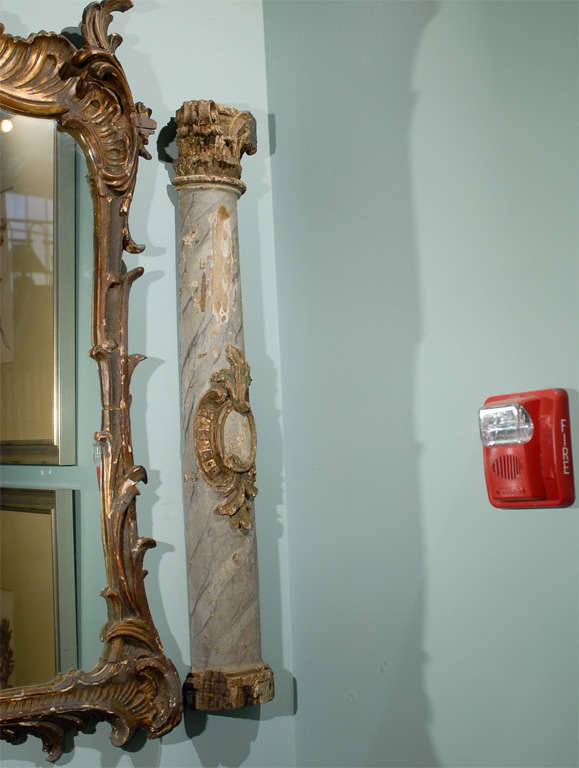 A beautiful pair of Italian decorative Faux-Marble semi-columns made of wood,  with Corinthian capitals and gorgeous decorative cartouches.