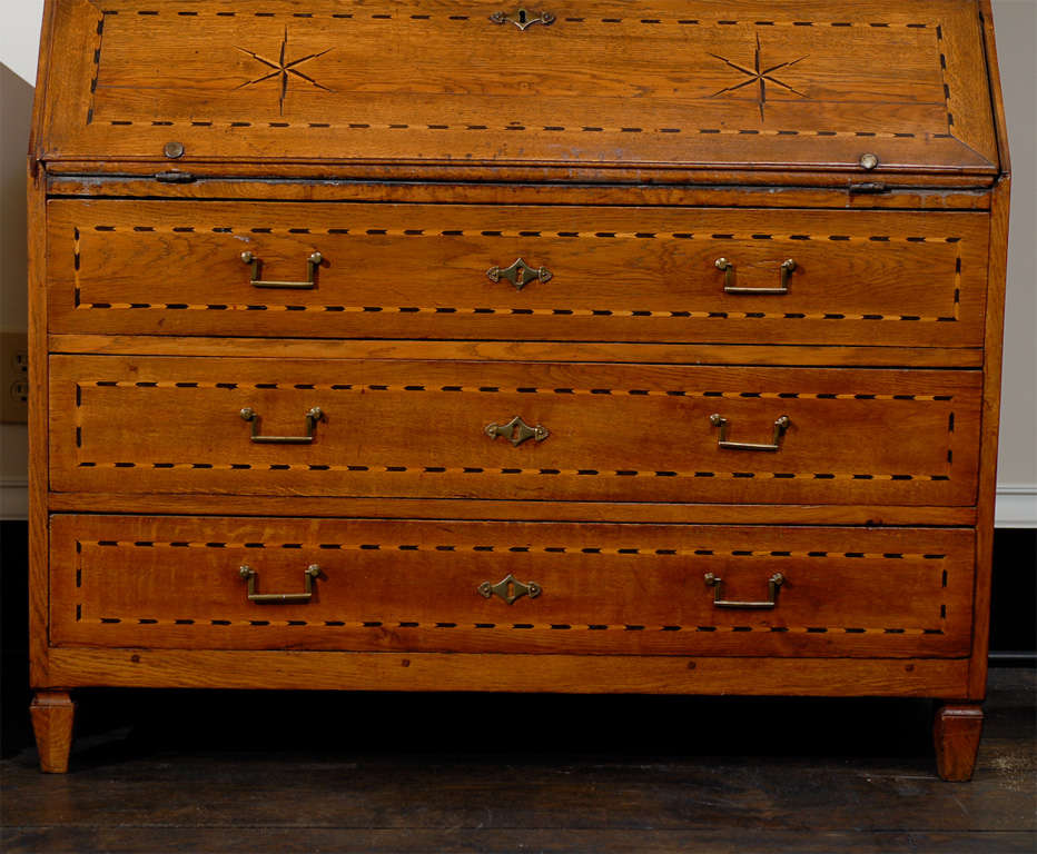 A pair of Swedish mid-18th century period Baroque tall slant-front secretaries with exquisite marquetry, wonderful pediment and stat inlay on the doors and desk part. Multiple drawers inside, over three lower drawers. Short tapered feet. These