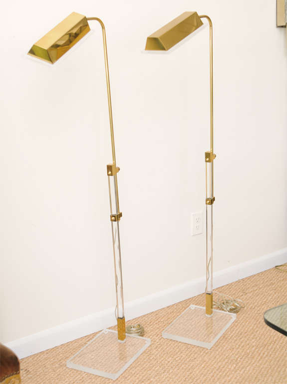 Pair Lucite and Brass adjustable floor lamps by Bauer