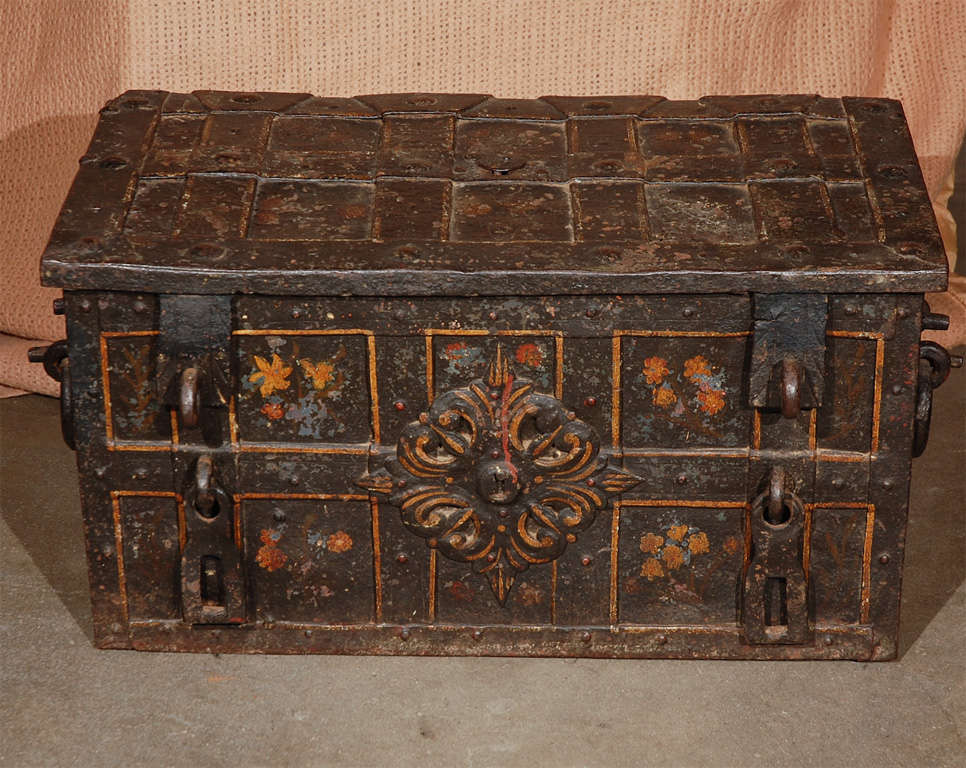 This Iron chest was used in the Pirates of the Caribbean movie, holding untold treasure. Dating from around the 1600's or earlier, this chest, with its bold structure and fittings, will indeed make an interesting feature in most settings.  