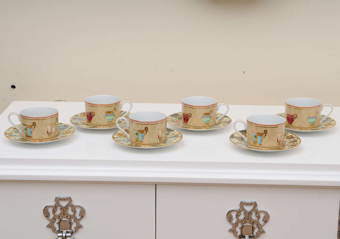 This beautiful, colorful and perfect gold rimmed Gucci tea/coffee service, probably has never been used. The great array of color in the figures is very symbolic. Italy was greatly influenced by  greek Mythology  and greek history at this time.It is