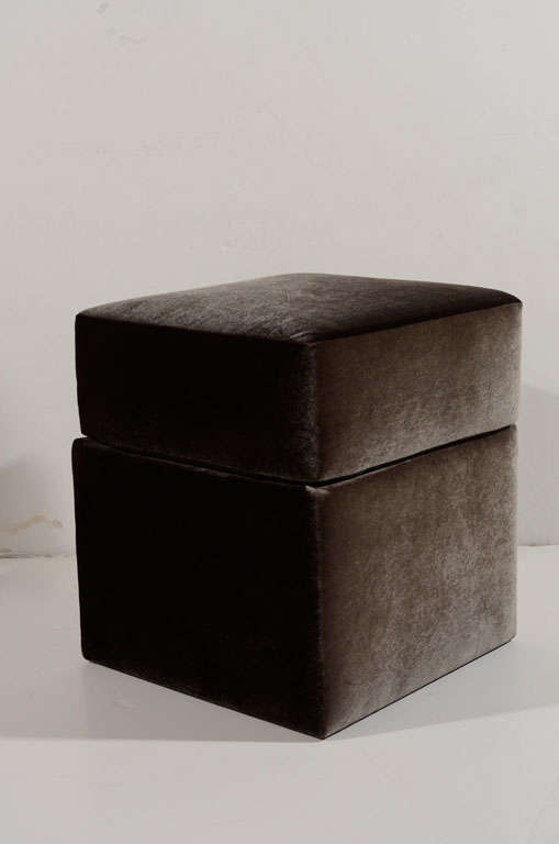 Modern ottoman/vanity stool with 
streamline design and cube shape.
Newly upholstered in a synthetic 
gunmetal velvet fabric. Elegant
and comfortable and works well
as a stool or bench option.