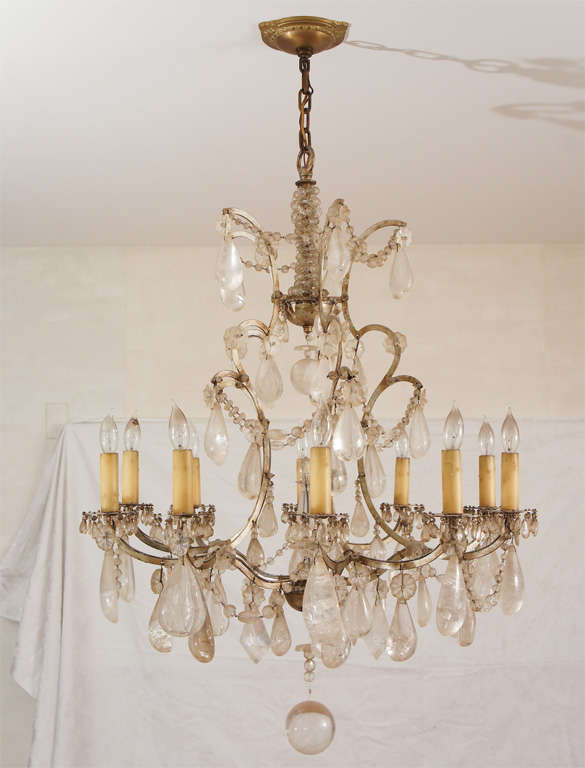Wonderful French Chandelier. The silver-gilt cage with 10 lights and rock crystals.