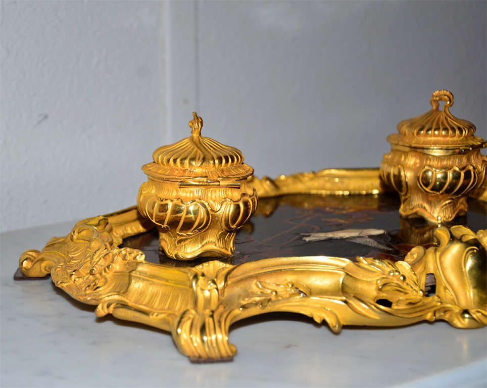 gilded bronze and red laque inkwell.