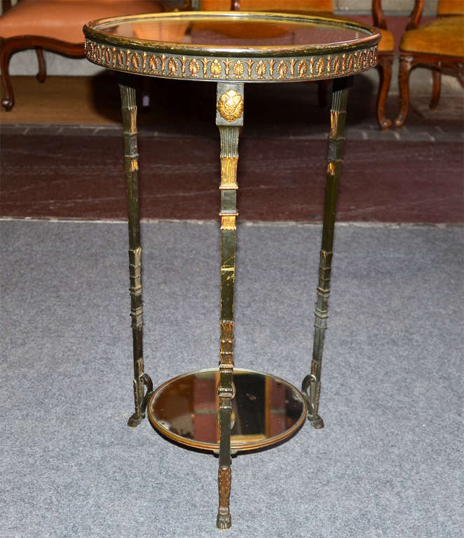 gold and green patina bronze Gueridon with top in  mercury mirror.