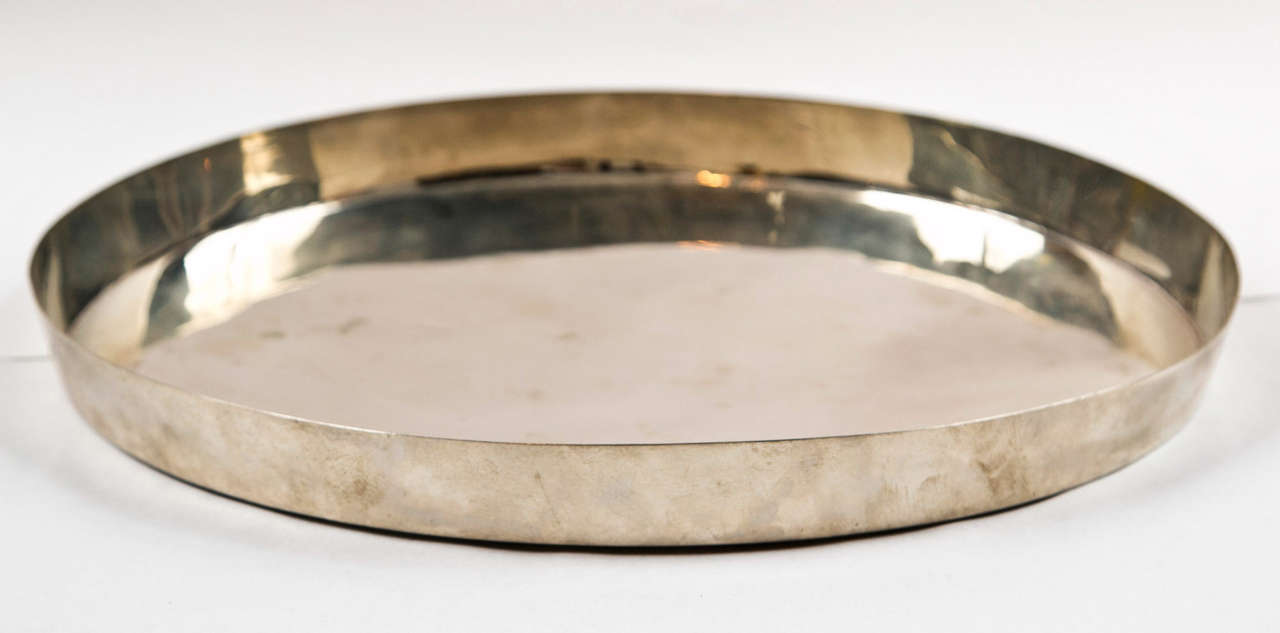 Silver plated brass oval tray 
Designed by Josef Hoffmann 

Made by the Wiener Werkstatte
Marked: MADE IN AUSTRIA 
WIENER WERK STATTE JH
Vienna, Austria 1920s

