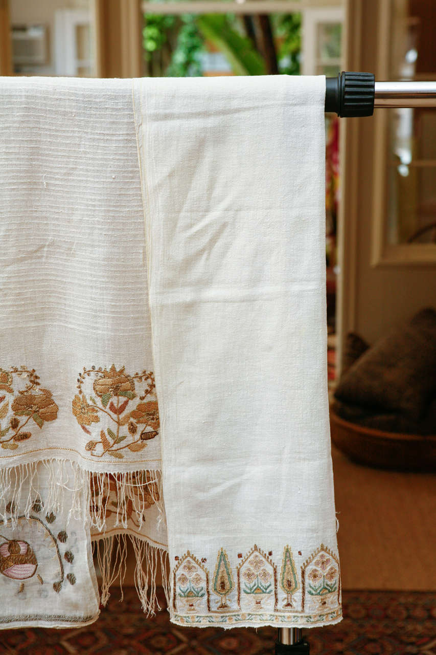 Group of 5 linen towels with double-sided hand embroidery.  Silk and metallic thread on linen.  Sizes and prices, left to right:
45