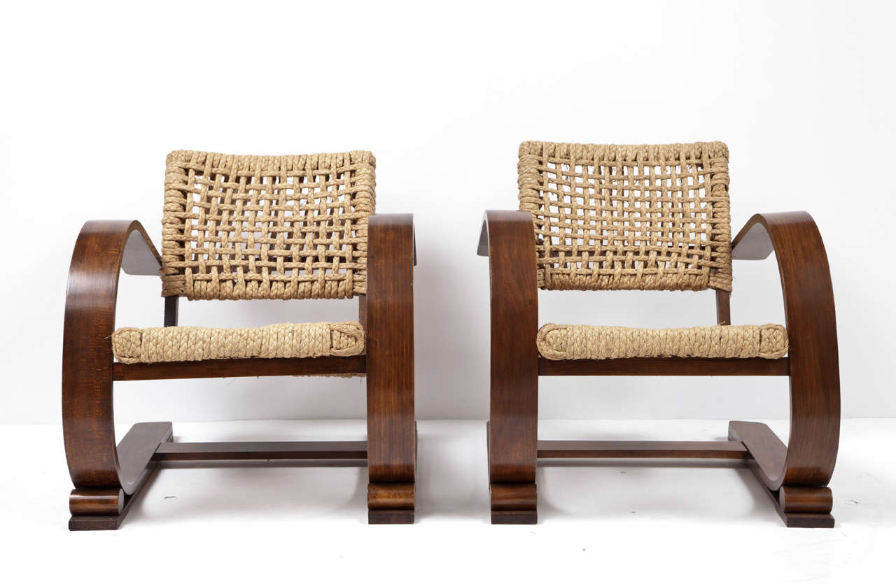 199's French Vibo Chairs feature bentwood frames with beaded rope seats and back