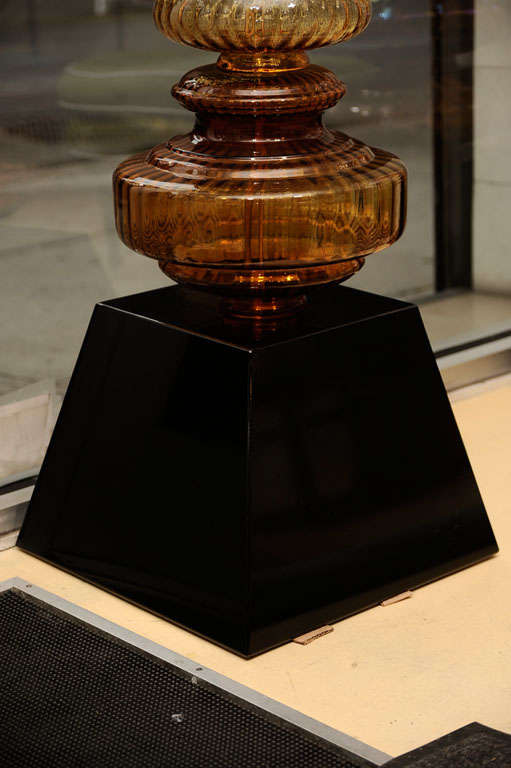 A very decorative glass sculpture by Corbett Reynolds. The glass is all vintage from the 1920's-1960's.