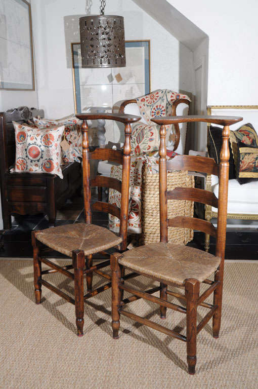 These petite, ladder back chairs were meant for children’s prayer. The quatrefoil attachment on the backs housed the bible. These chairs are so multifunctional. They can be set in a recessed area and embellished with books or a potted plant set atop