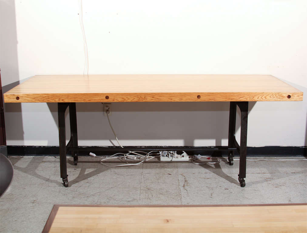 Pine bowling alley table with Bench Master legs, casters with brakes.