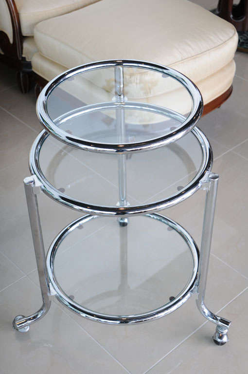 Glass Single Chrome Rolling Swivel Side Table Attributed to Gilbert Rohde For Sale