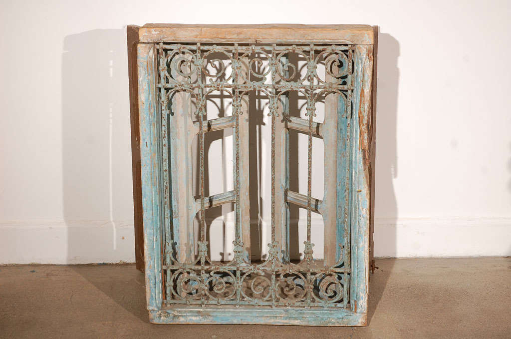 Antique Moroccan Window with Iron Screen In Distressed Condition In North Hollywood, CA
