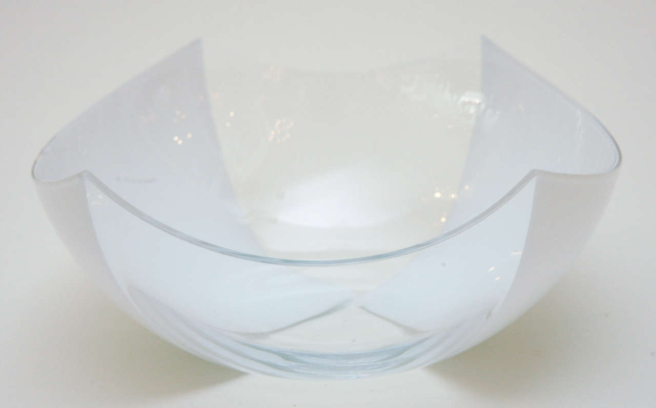 A chic tipped corner Murano glass bowl in alternating quarters of white and clear glass. Signed on the bottom 