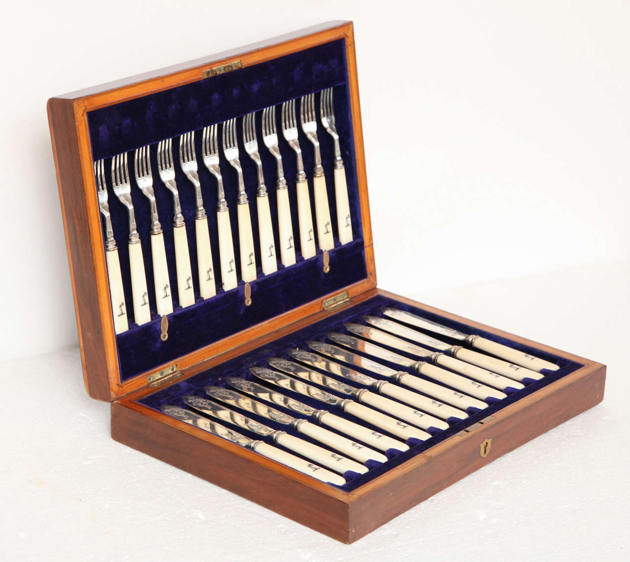 Set of Twelve Silver and Bone Fish Knives and Forks