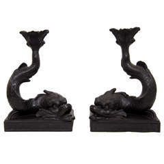 A Pair of Wedgwood Black Basalt Dolphin Candlesticks