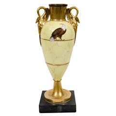 A Gilded Vase with an Eagle on a Marbleized Yellow Ground