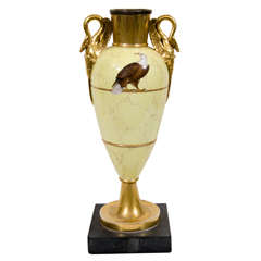 Antique A Gilded Vase with an Eagle on a Marbleized Yellow Ground