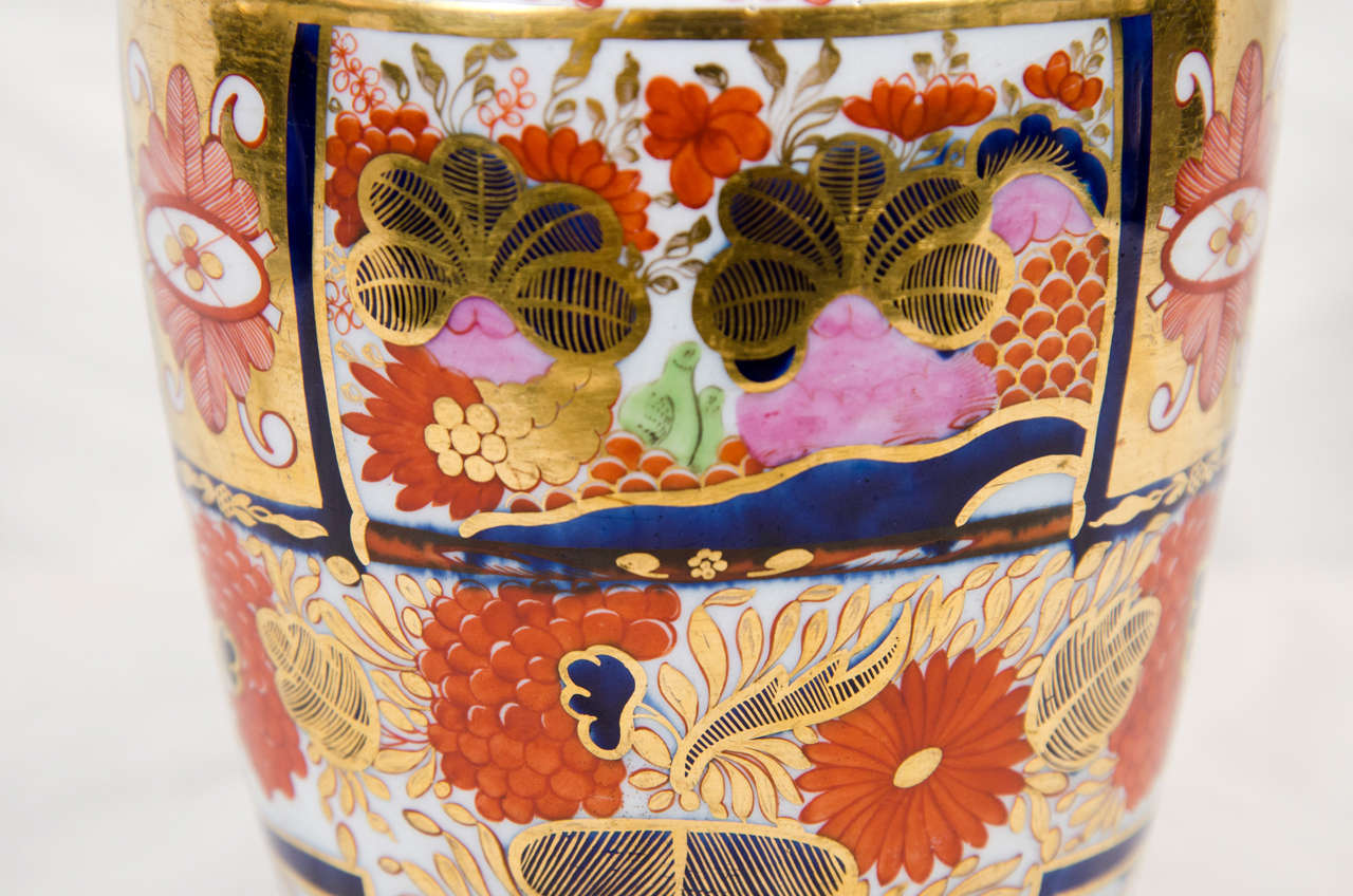 A vibrantly colored pitcher decorated with Chamberlain's Worcester  #240 