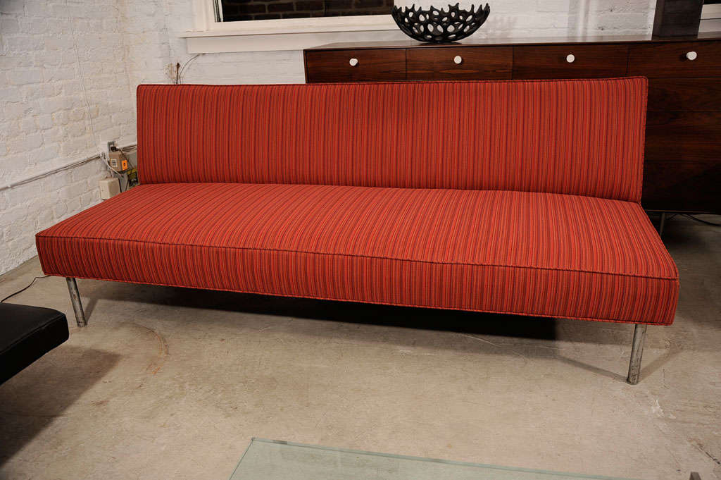 George Nelson sofa, mfg. Herman Miller, reupholstered in Knoll fabric.  There is a coordinating chair which has been reupholstered in the same fabric line but different color.  Call or email for photos.