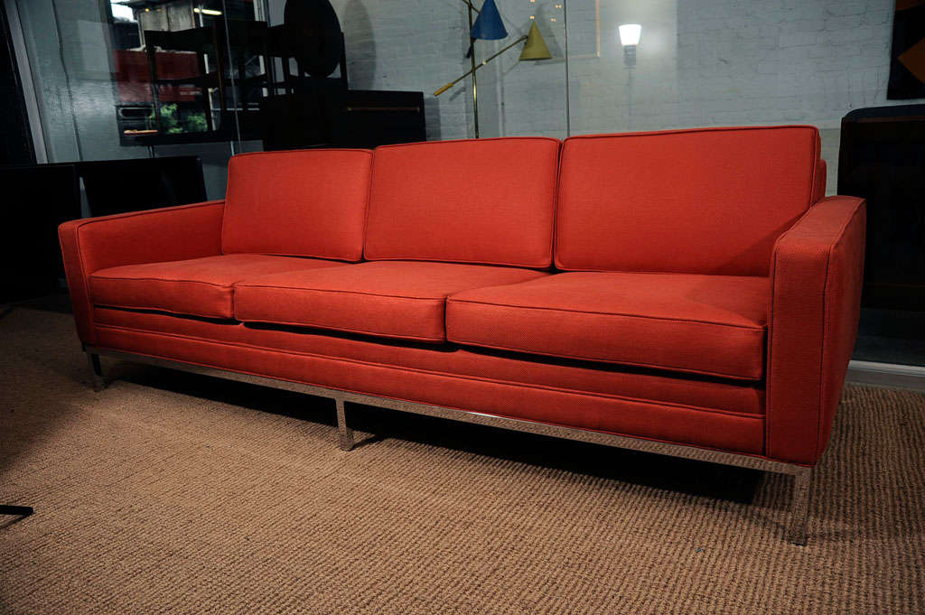 1950's Steelcase sofa on chrome base, redone in an burnt orange Kravet linen.  Nicely proportioned and clean lines.