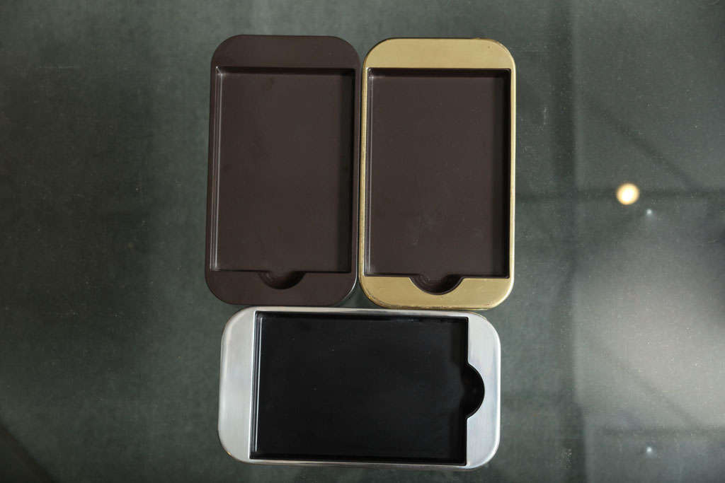 These trays were originally designed in the pre-cell phone era of the 1970s to hold notepad paper, however they are perfectly sized for a Samsung Note, iPhone and other cell phones.  From the Radius One Metal Collection designed by William Sklaroff