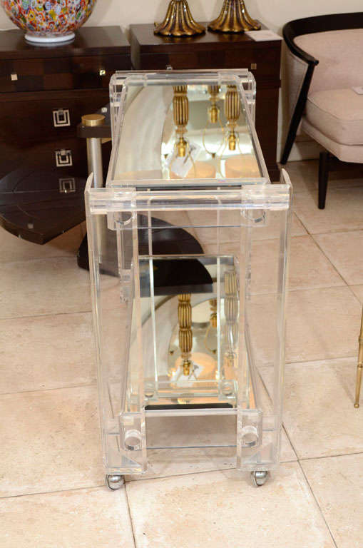 Lucite rolling cart featuring two mirrored shelves 5