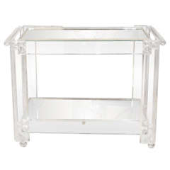 Lucite rolling cart featuring two mirrored shelves