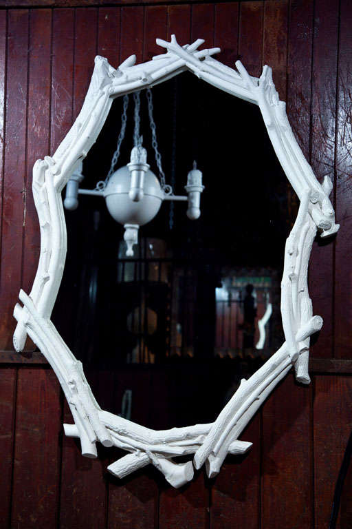 Wonderful old plaster mirror in the form of twigs.