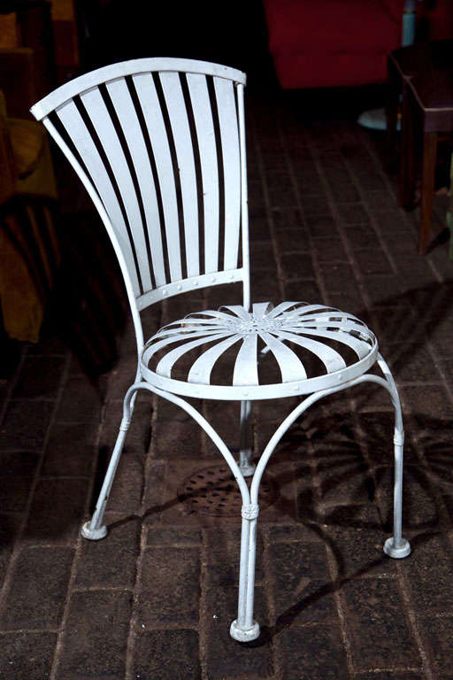 Vintage Set of Four Spring Chairs and Round Table For Sale at 1stdibs