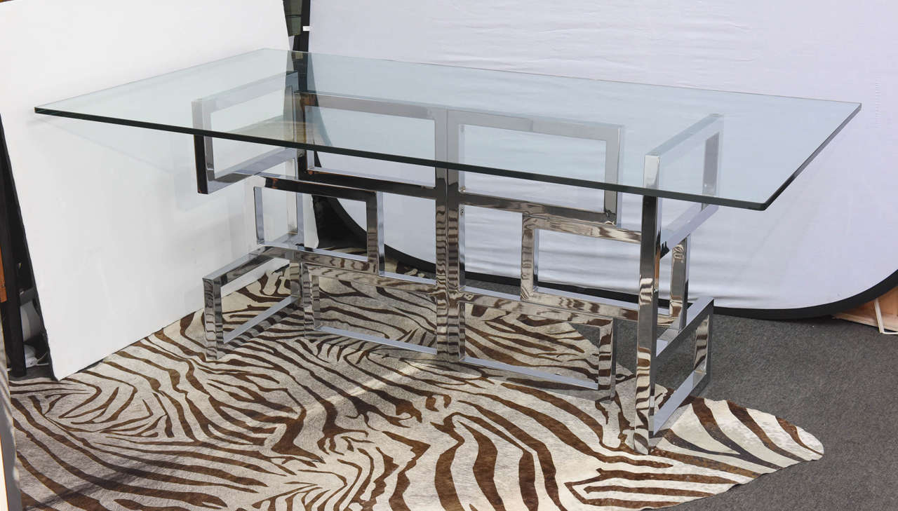 Heavy chrome and glass are excellent quality. Milo Baughman or Pace Collection cannot be confirmed, but that I know, the table come from a stylish 1970s apartment where all pieces were signed.
This piece can be use for a home or an office as a