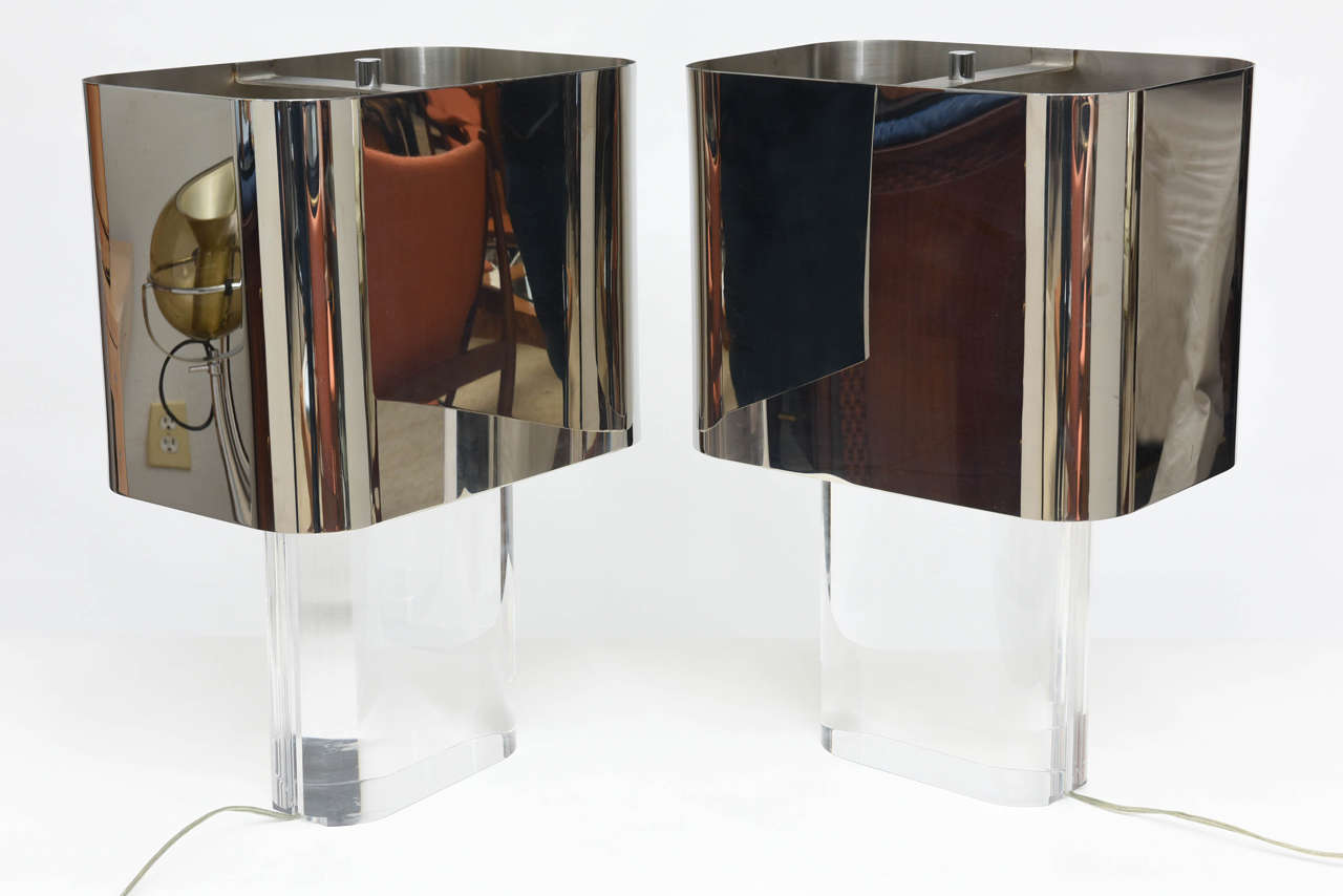 The chrome shade with rounded edges over a chunky Lucite base
provenance ex collection Howard Rothberg, Karl Springer receipts available.