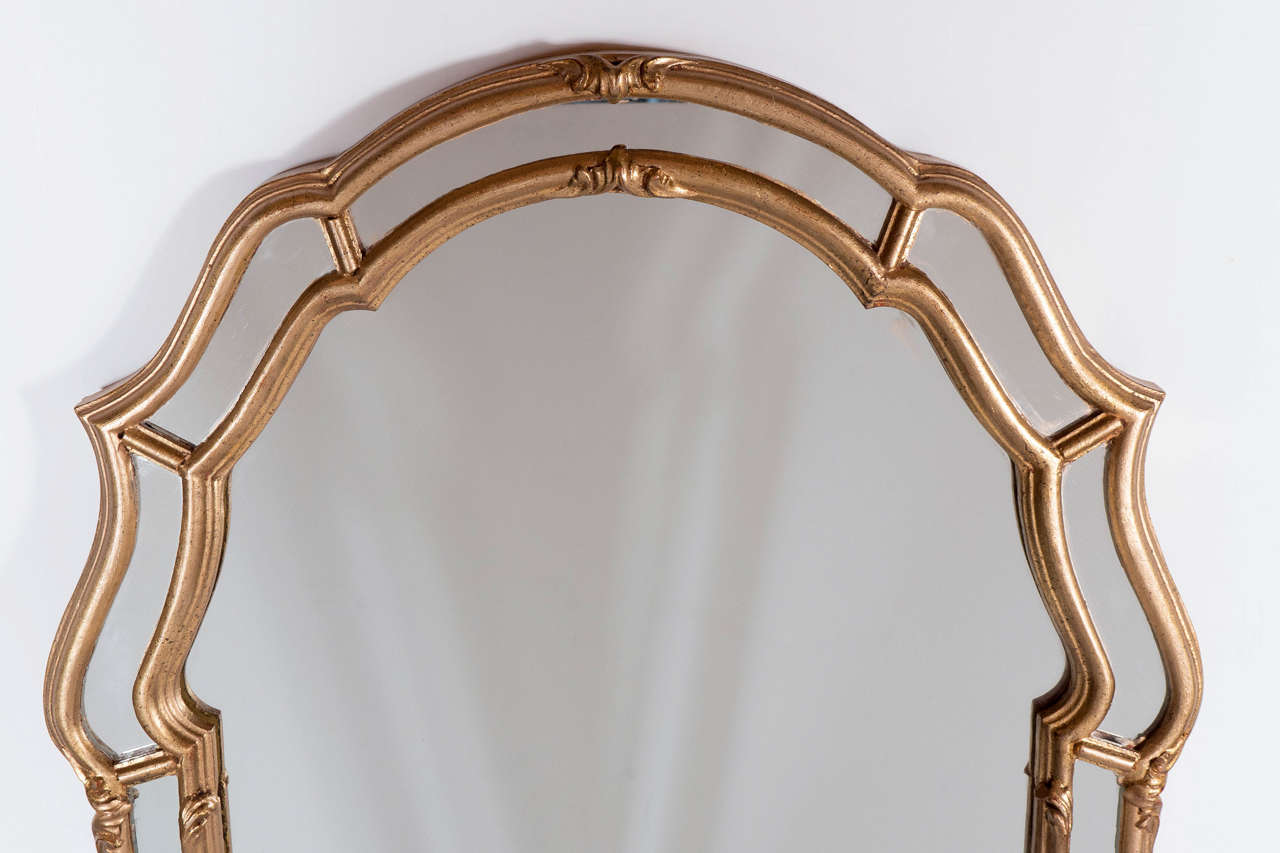 Stunning Mid-Century Modernist Gilt Mirror With Scroll Form Detailing In Excellent Condition In New York, NY