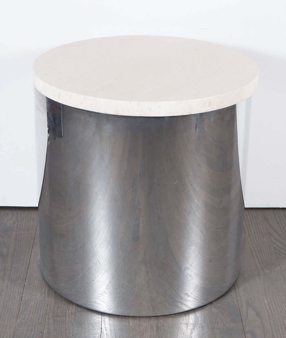 This Mid-Century Modernist Drum Table is by Paul Mayen for Habitat. If features a cylindrical chrome base inset with a exquisite travertine top.This table would fit well in any decor and is a great size.
