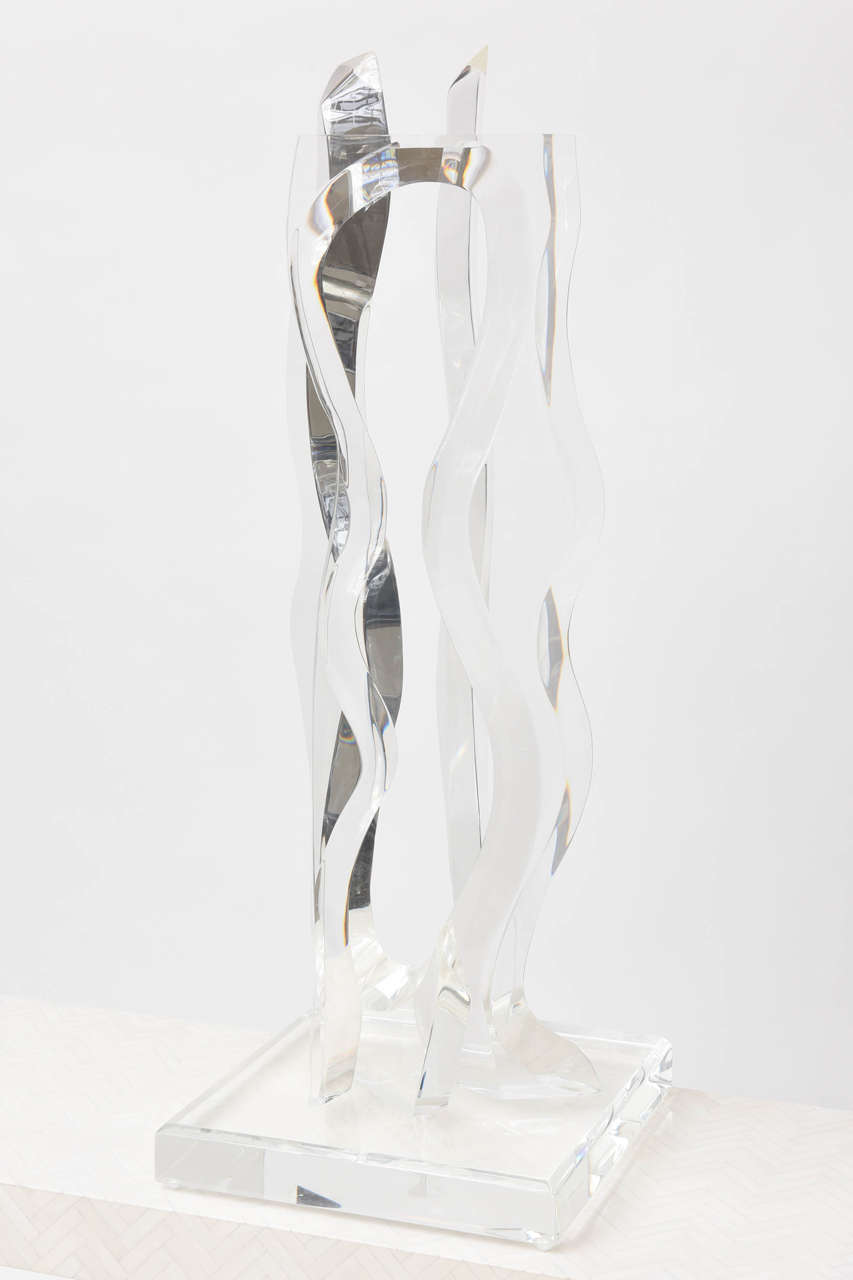 A towering abstract acrylic table sculpture by Hivo Van Teal. Signed, 