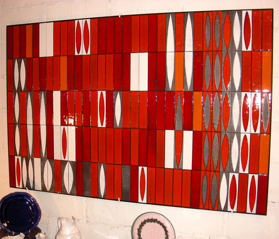 Large 1970s ceramic tiles panel, with white, red, slate tone elements.